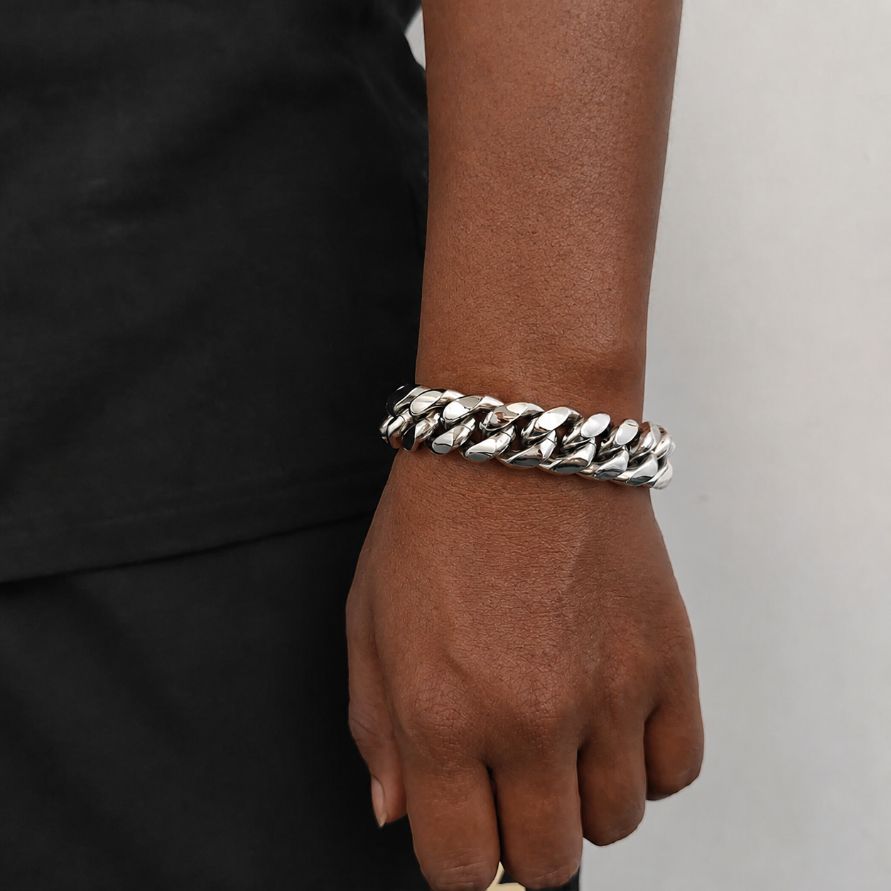 18mm steel Miami Cuban link bracelet on natural deep brown skin