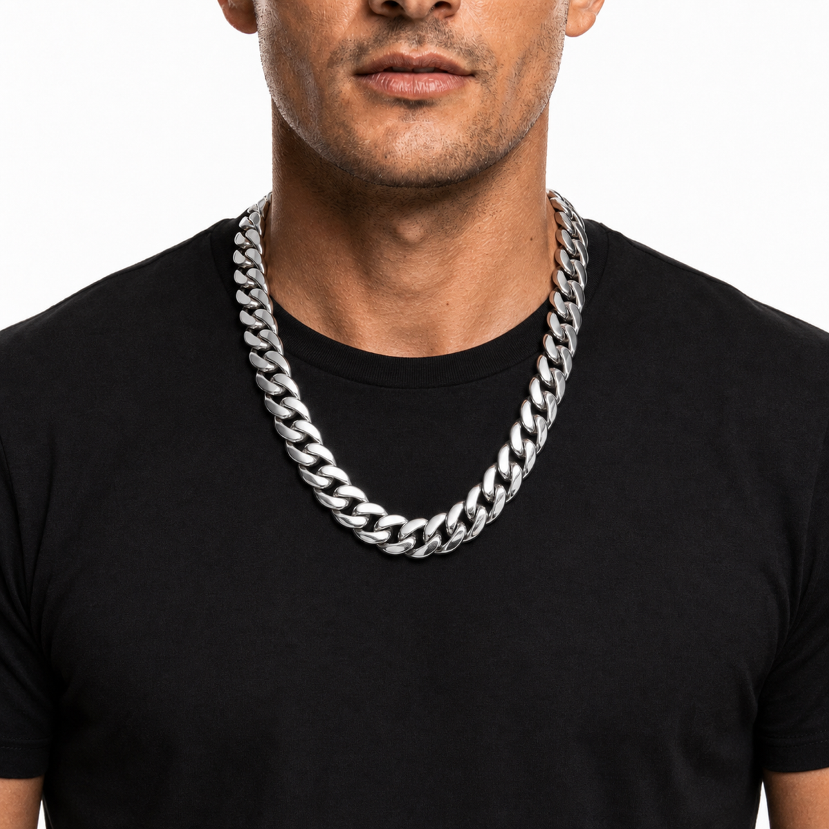 Male model wearing a 20mm stainless steel Miami Cuban chain in silver tone