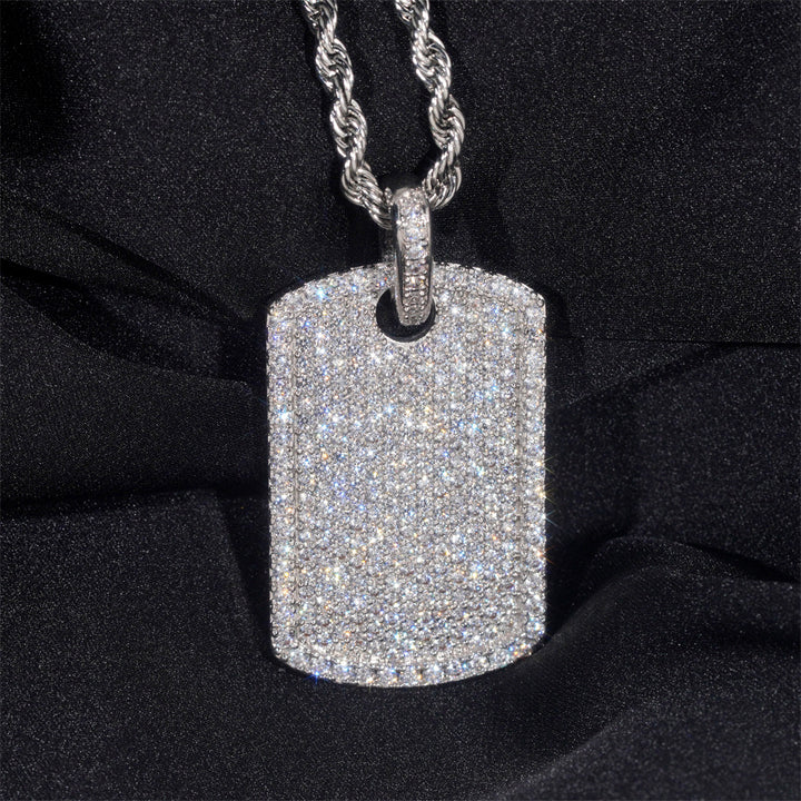 Silver-tone rectangular dog tag pendant with clear stones on a chain