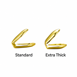 Standard and extra thick gold-tone single tooth grills compared in side profile