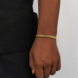 6mm gold Miami Cuban link bracelet on natural deep brown skin