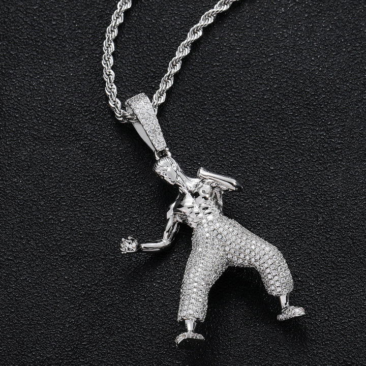 Silver-tone figure pendant on a chain against a dark surface