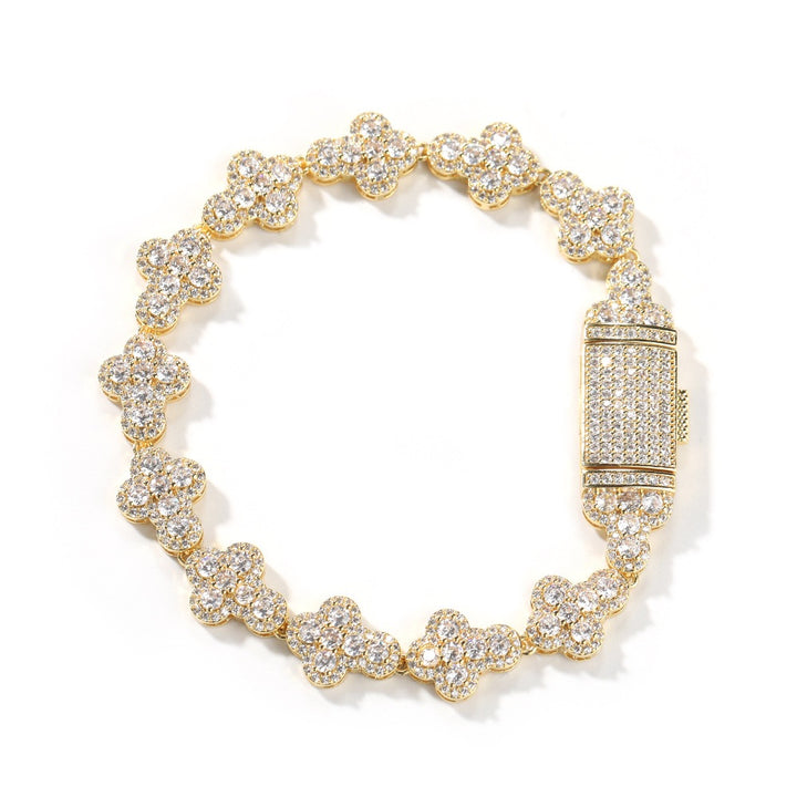 Gold-tone flower-link bracelet with rectangular clasp on white