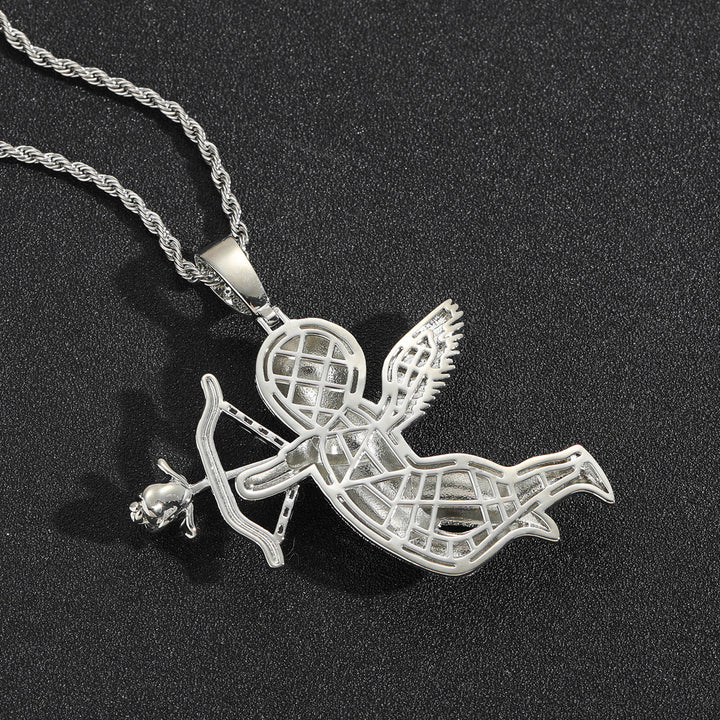 Back of a silver-tone Cupid pendant showing the wings and open settings