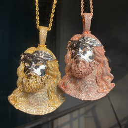 Gold-tone and rose-gold-tone Jesus portrait pendants with silver-tone faces