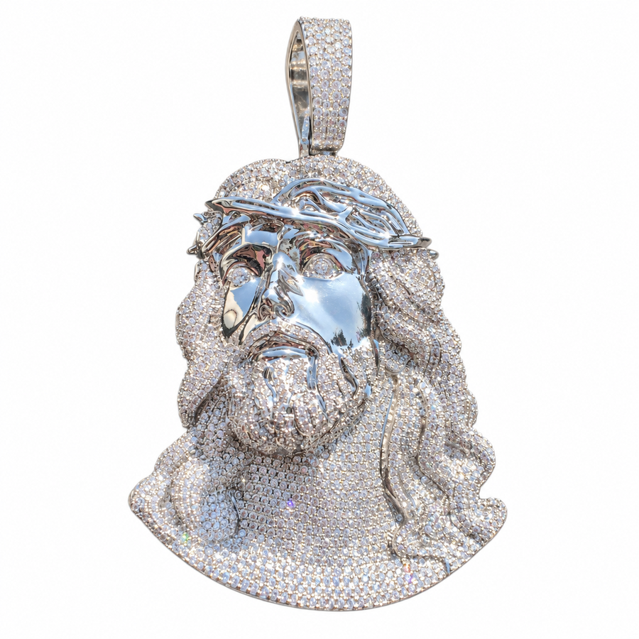 Silver-tone Jesus portrait pendant with a stone-set beard and bail on white