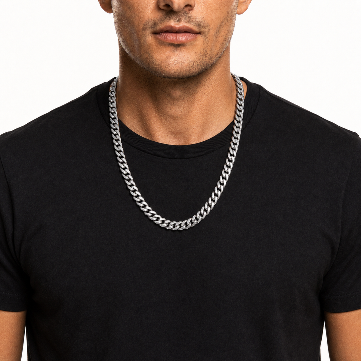 Male model wearing a 8mm stainless steel Miami Cuban chain in silver tone