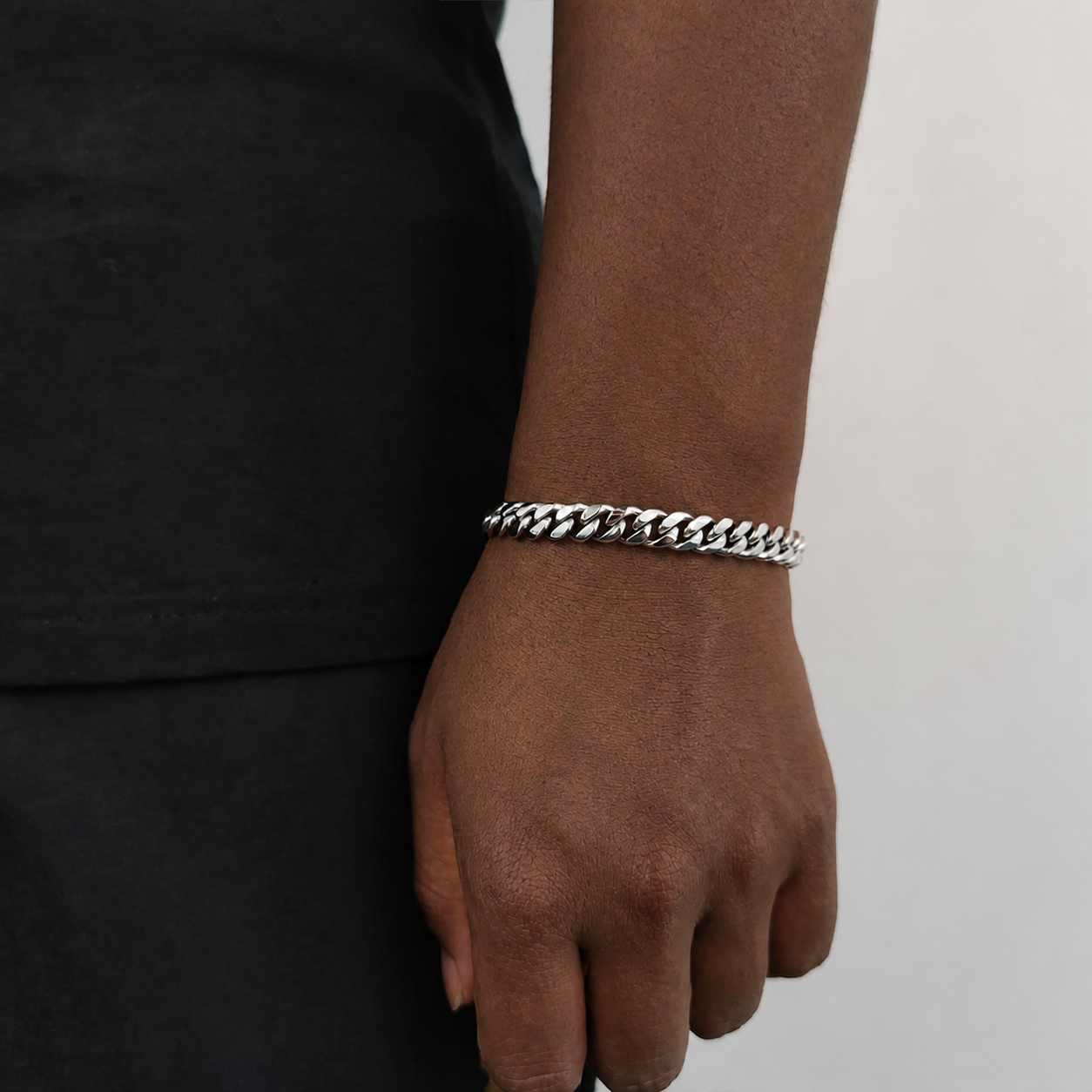 8mm steel Miami Cuban link bracelet on natural deep brown skin