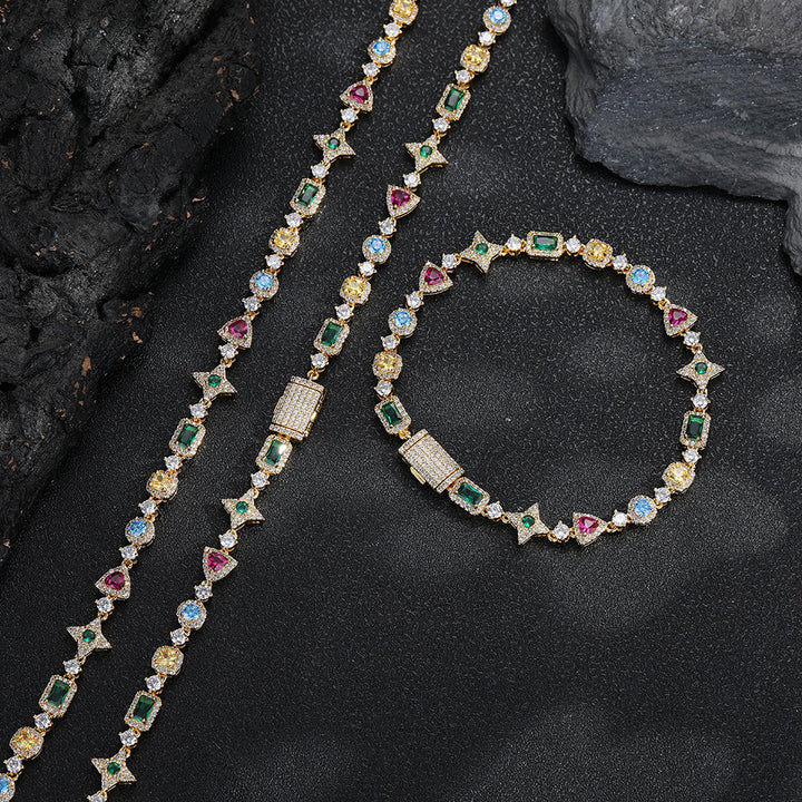 Gold-tone geometric bracelet beside a matching necklace