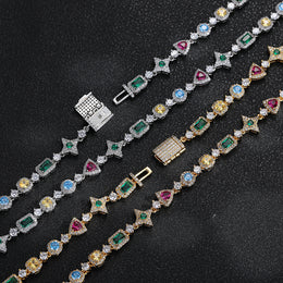 Silver and gold-tone geometric jewelry with box clasp details