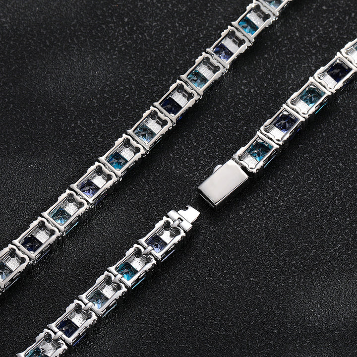 Back and clasp view of two multicolor tennis chains