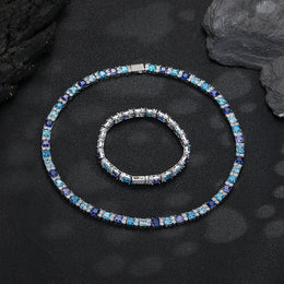 Multicolor tennis necklace and matching bracelet arranged on black