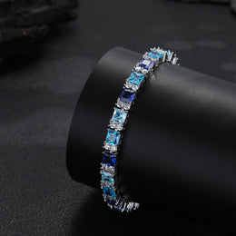 Multicolor tennis bracelet on a black display cuff