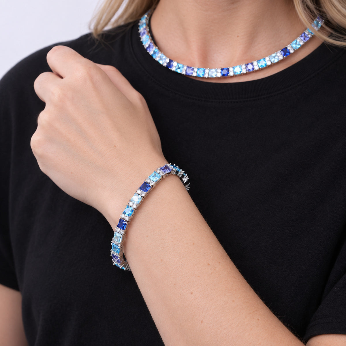 Multicolor tennis necklace and bracelet worn by a female model