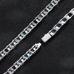 Back and clasp view of two multicolor tennis chains