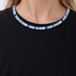 Multicolor tennis necklace worn by a female model