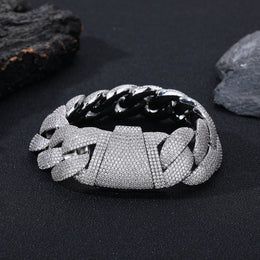 Silver iced Bubble Cuban link bracelet on black stone