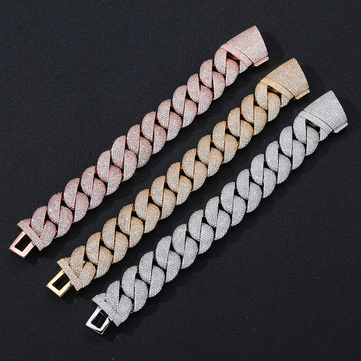 Three iced Bubble Cuban necklace finishes laid flat on black