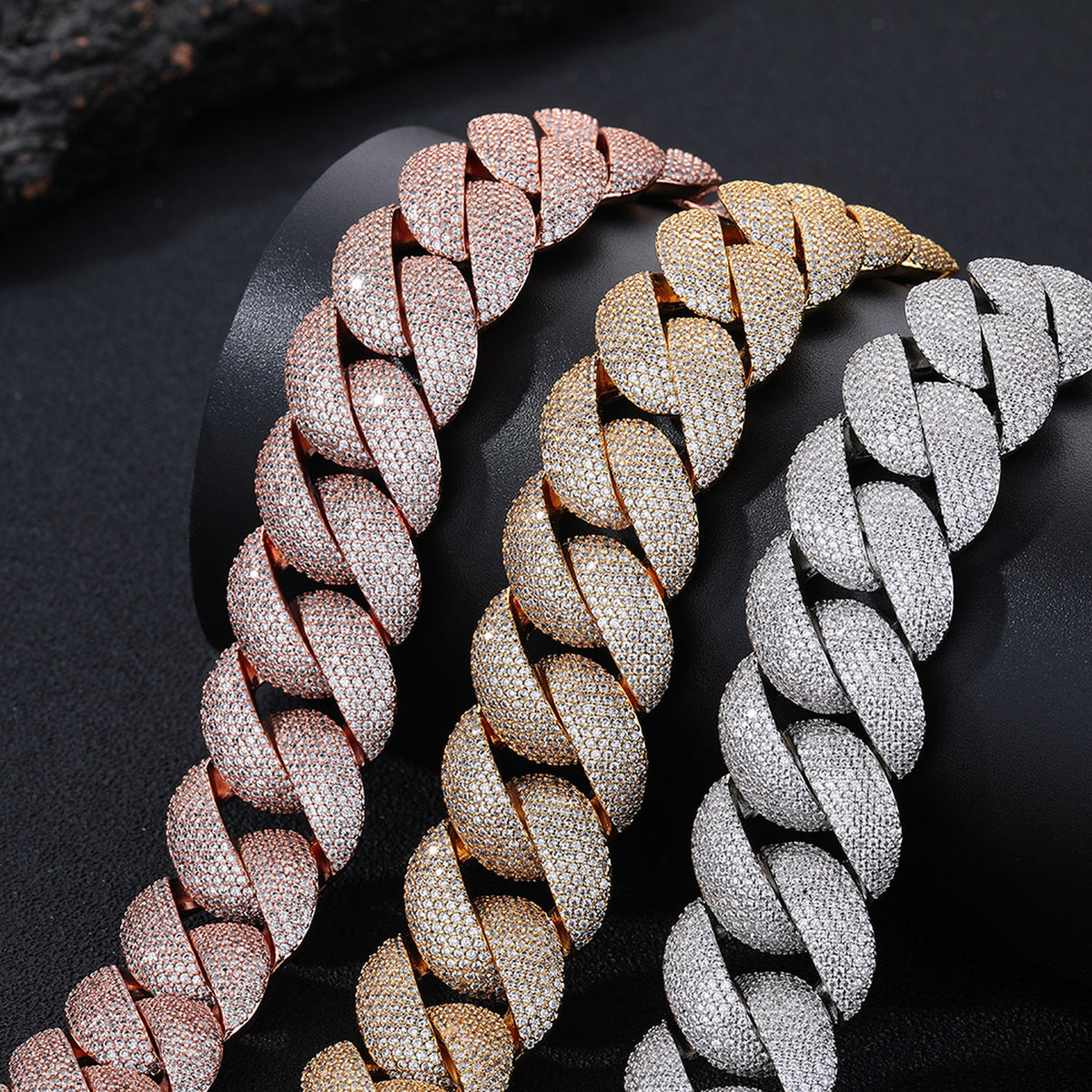 Close-up of Silver Gold and Rose Gold pavé Cuban links