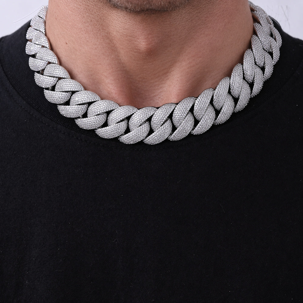 Silver iced Bubble Cuban necklace worn by a muscular Western model