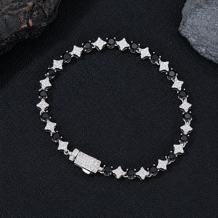 Silver-tone black round stone and clear star link bracelet with a box clasp on black fabric