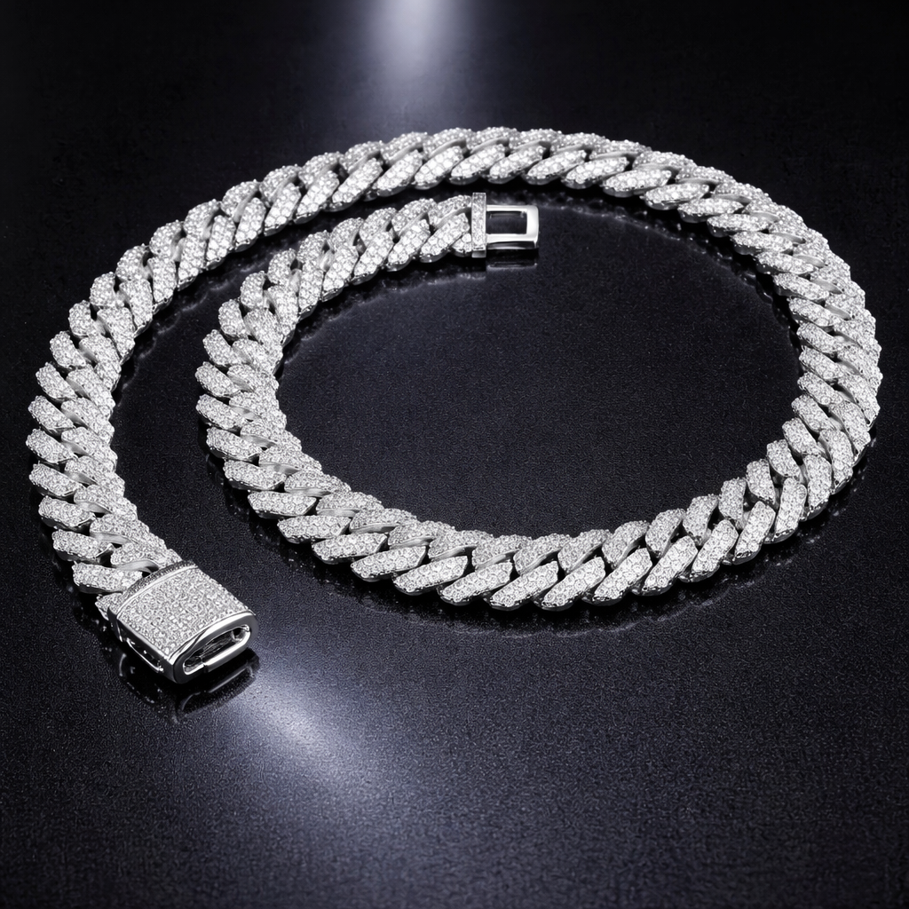 Iced out Cuban link chain necklace with sparkling stones on black background - Miles Jewellery