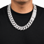 Person wearing a large silver chain 