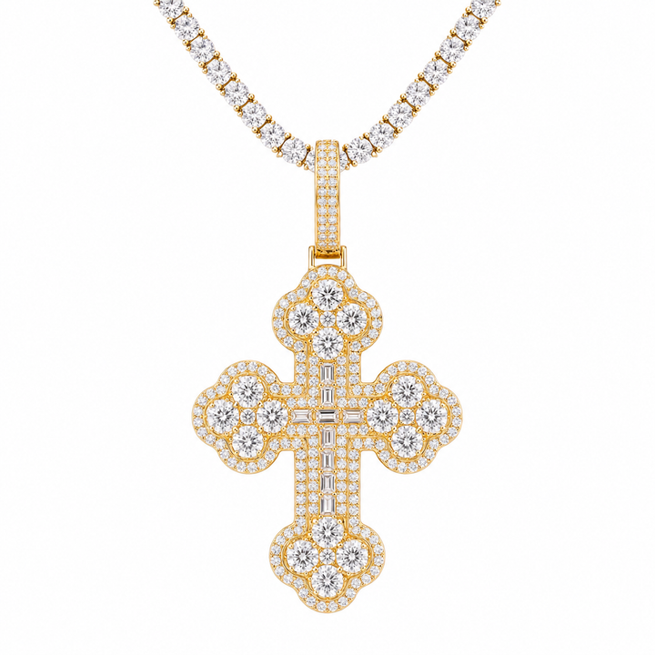 Gold-tone cross pendant with rounded ends and clear stones on a chain