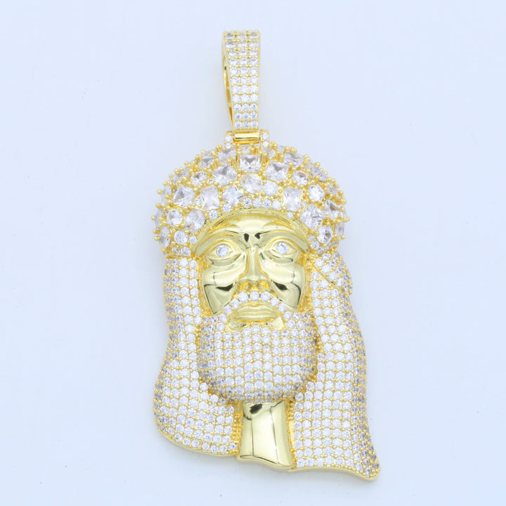 Gold-tone bearded portrait pendant with a stone-set head covering