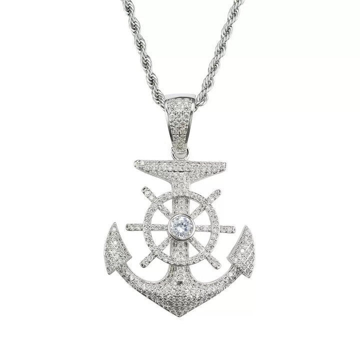 Silver-tone stone-set anchor and ship's wheel pendant on a chain