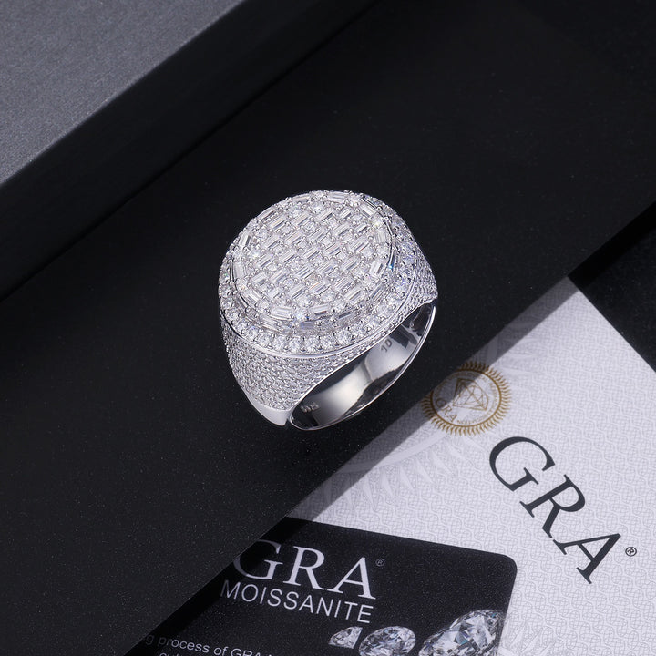 Round stone-set signet ring displayed beside GRA paperwork
