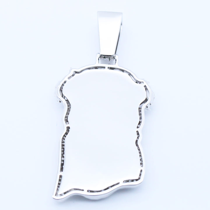 Smooth back of a silver-tone Jesus head pendant