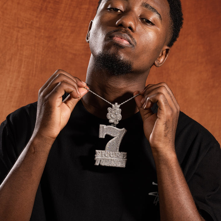 Model displaying silver iced 7 Figure Twizz pendant