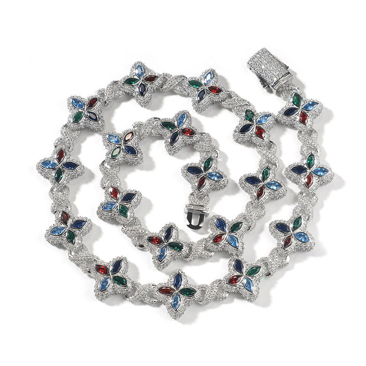 Silver-tone butterfly-link necklace with colored accent stones coiled on white