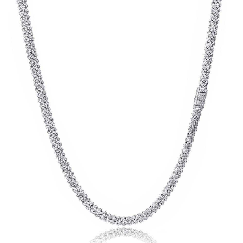 Iced out silver tennis chain with round cut stones on white background - Miles Jewellery