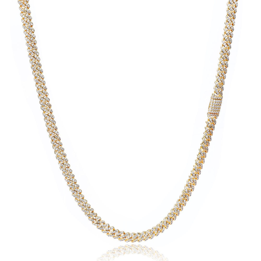 Gold iced out tennis chain necklace with sparkling stones on white background - Miles Jewellery