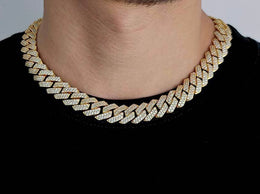 Gold cuban link chain encrusted with diamonds worn on neck, hip hop jewelry style - Miles Jewellery