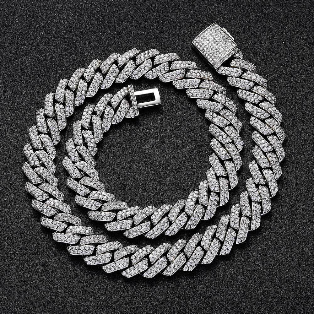 Iced out Cuban link chain with clear stones on black background - Miles Jewellery