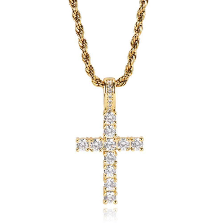 Gold-tone stone-set cross pendant on a rope chain against white