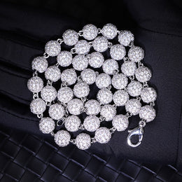 Close-up of iced moissanite bead necklace stones