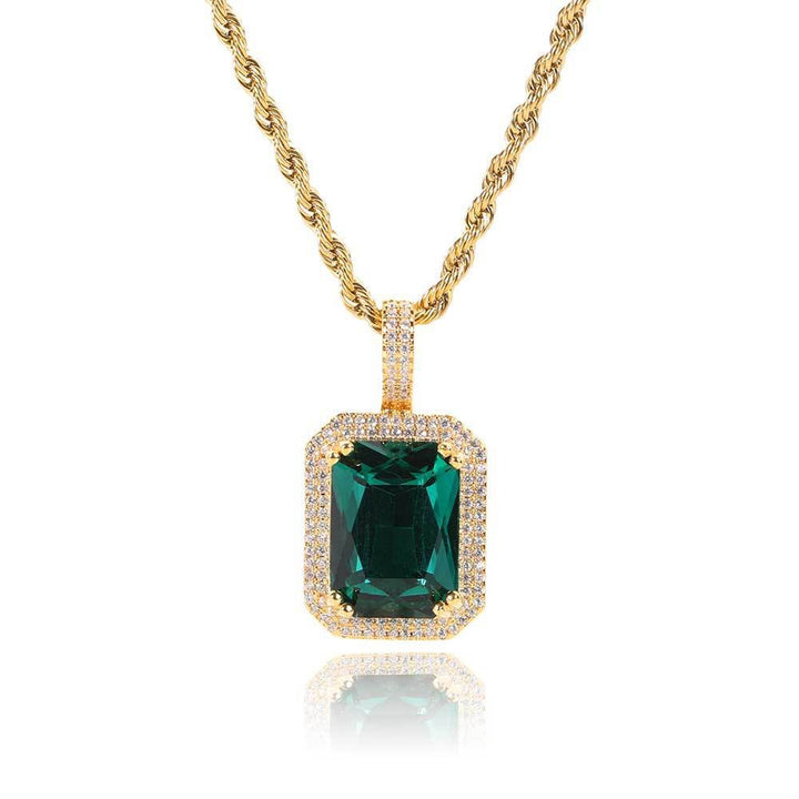 Gold-tone halo pendant with a rectangular green stone on a rope chain
