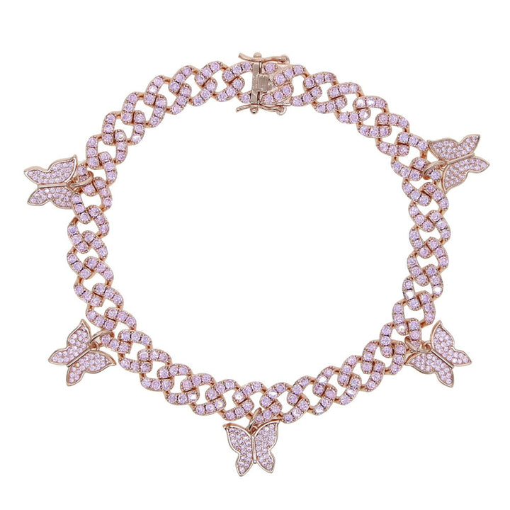 Pink-tone Cuban link bracelet with butterfly charms