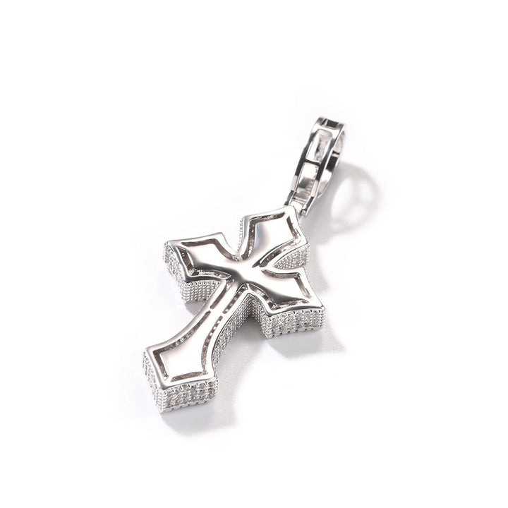 Openwork back of a silver-tone flared cross pendant