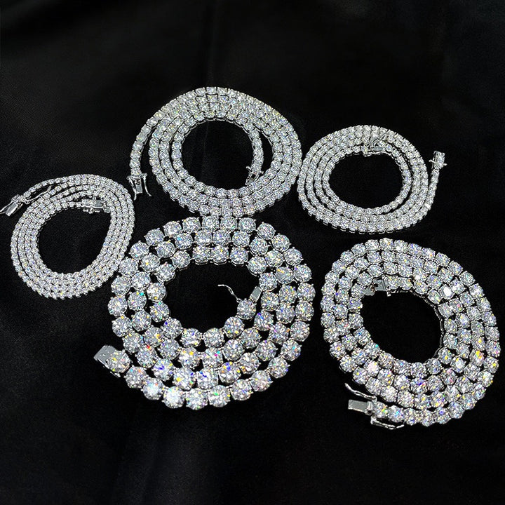 Silver-tone tennis chains in several widths coiled side by side