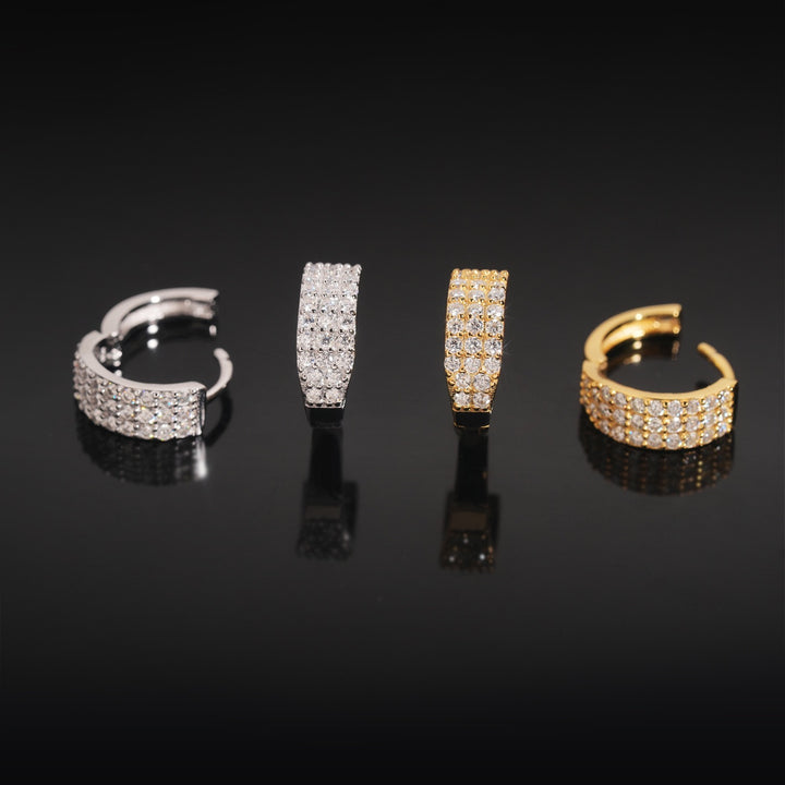 Front and side views of gold-tone and silver-tone stone-set hoop earrings