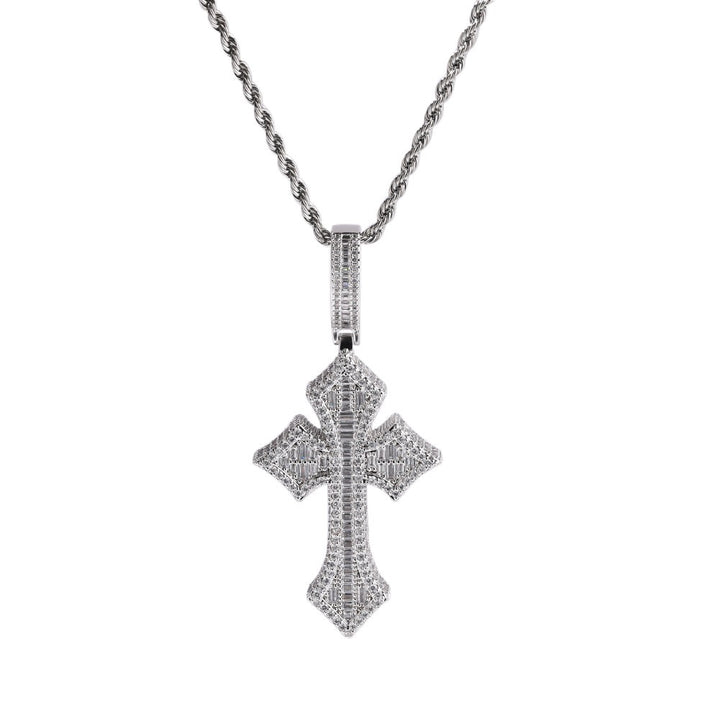 Silver-tone stone-set flared cross pendant on a rope chain against white