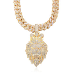 Gold necklace with a lion head pendant on a white background