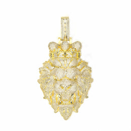 Gold lion-shaped pendant on a white background