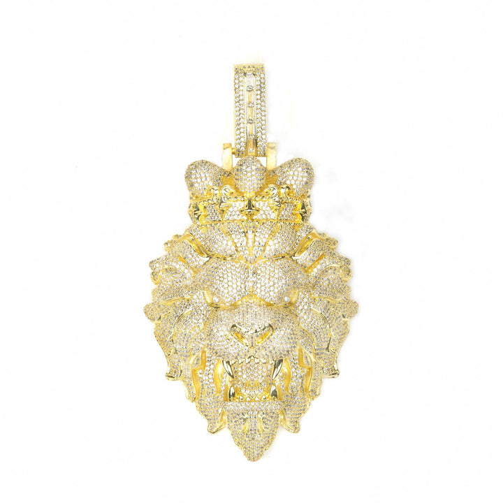 Gold lion-shaped pendant on a white background