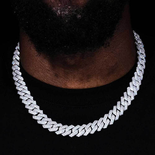 Man wearing an iced out Cuban link chain necklace with sparkling stones - Miles Jewellery